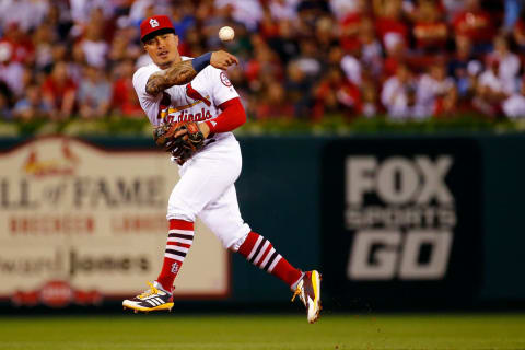 ST. LOUIS, MO – SEPTEMBER 21: Kolten Wong #16 of the St. Louis Cardinals throws to first base against the San Francisco Giants in the first inning at Busch Stadium on September 21, 2018 in St. Louis, Missouri. (Photo by Dilip Vishwanat/Getty Images)