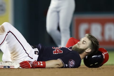 WASHINGTON, DC – SEPTEMBER 04: Bryce Harper #34 of the Washington Nationals lays on the ground after hitting an two-run RBI ground rule double in the fifth inning against the St. Louis Cardinals at Nationals Park on September 4, 2018 in Washington, DC. (Photo by Patrick McDermott/Getty Images)