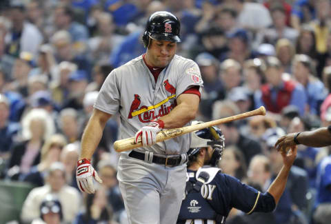 MILWAUKEE, WI – APRIL 7: Lance Berkman #12 of the St. Louis Cardinals reacts after striking out during the second inning against the Milwaukee Brewers at Miller Park on April 7, 2012 in Milwaukee, Wisconsin. Photo by Brian Kersey/Getty Images)