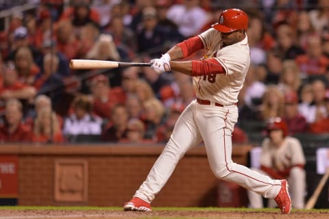 ST. LOUIS, MO – SEPTEMBER 13: Oscar Taveras #18 of the St. Louis Cardinals hits a RBI single in the sixth inning at Busch Stadium on September 13, 2014 in St. Louis, Missouri. The Cardinals defeated the Rockies 5-4. (Photo by Michael B. Thomas/Getty Images)