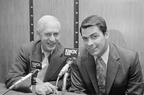 (Original Caption) Mike Shannon (R) former Cardinal third baseman, will join Jack Buck (L) in broadcasting the 1972 St. Louis Cardinal baseball games. Shannon, 32, was sidelined with a kidney ailment in 1970 and worked for the Cardinal front office in promotion and sales this year. Buck and Shannon, at the announcement, said Buck will do the complete play-by-play and Shannon the color and commentary on the game.