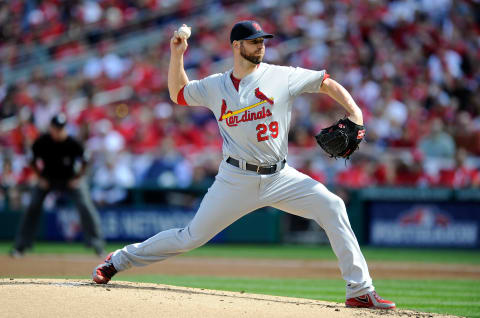 WASHINGTON, DC – OCTOBER 10: Chris Carpenter #29 of the St. Louis Cardinals pitches against the Washington Nationals during Game Three of the National League Division Series at Nationals Park on October 10, 2012 in Washington, DC. (Photo by G Fiume/Getty Images)