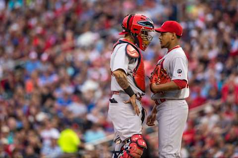 MINNEAPOLIS, MN – JUNE 17: Yadier Molina #4 of the St. Louis Cardinals talks with Carlos Martinez #18 against the Minnesota Twins on June 17, 2015 at Target Field in Minneapolis, Minnesota. The Twins defeated the Cardinals 3-1. (Photo by Brace Hemmelgarn/Minnesota Twins/Getty Images)