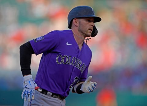 Trevor Story #27 of the Colorado Rockies rounds the bases after hitting a two run home run in the first inning of the game against the Los Angeles Angels at Angel Stadium of Anaheim on July 28, 2021 in Anaheim, California. (Photo by Jayne Kamin-Oncea/Getty Images)