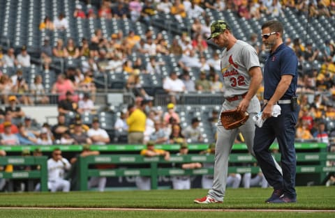 PITTSBURGH, PA – MAY 22: Steven Matz #32 of the St. Louis Cardinals walks off the field with a trainer after coming out to the game with an injury in the first inning against the Pittsburgh Pirates at PNC Park on May 22, 2022 in Pittsburgh, Pennsylvania. (Photo by Justin Berl/Getty Images)