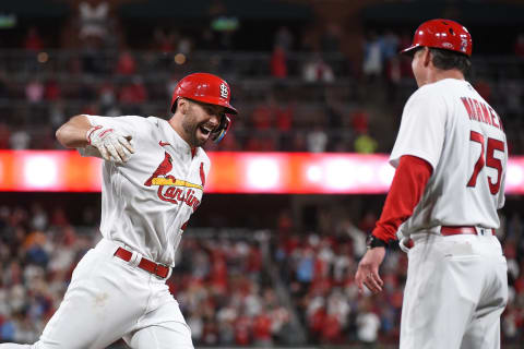 ST LOUIS, MO – MAY 23: Paul Goldschmidt #46 of the St. Louis Cardinals is congratulated by Ron Pop’ Warner #75 of the St. Louis Cardinals after hitting a walk-off grand slam against the Toronto Blue Jays during the tenth inning at Busch Stadium on May 23, 2022 in St Louis, Missouri. (Photo by Joe Puetz/Getty Images)