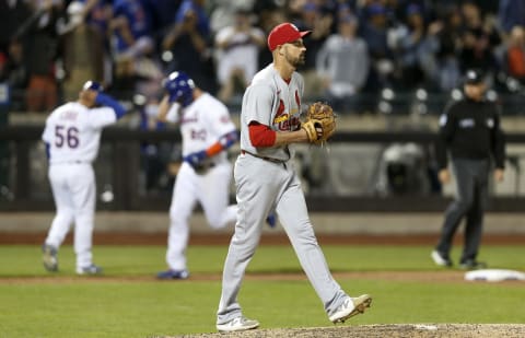 NEW YORK, NEW YORK – MAY 18: T.J. McFarland #62 of the St. Louis Cardinals reacts after surrendering an eighth inning three–run home run against Pete Alonso #20 of the New York Mets at Citi Field on May 18, 2022 in New York City. (Photo by Jim McIsaac/Getty Images)