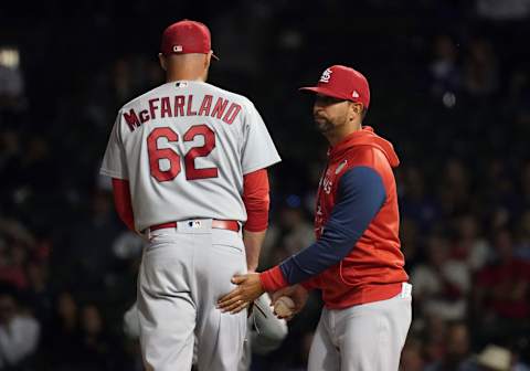 CHICAGO, ILLINOIS – JUNE 02: Manager Oliver Marmol #37 of the St. Louis Cardinals removes T.J. McFarland #62 of the St. Louis Cardinals during the eighth inning of a game against the Chicago Cubs at Wrigley Field on June 02, 2022 in Chicago, Illinois. The Cubs defeated the Cardinals 7-5. (Photo by Nuccio DiNuzzo/Getty Images)