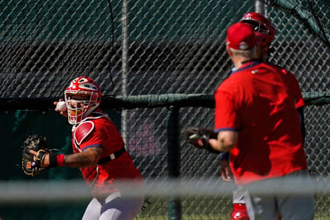 Feb 26, 2021; Jupiter, Florida, USA; St. Louis Cardinals catcher Yadier Molina (4) throws the ball during spring training workouts at Roger Dean Stadium. Mandatory Credit: Jasen Vinlove-USA TODAY Sports