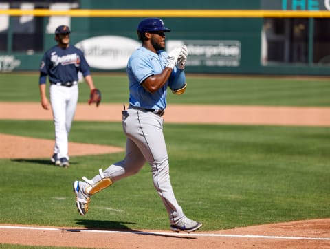 Mar 14, 2021; North Port, Florida, USA; Tampa Bay Rays left fielder Moises Gomez (93) reacts after hitting a home run against the Atlanta Braves. Mandatory Credit: Nathan Ray Seebeck-USA TODAY Sports