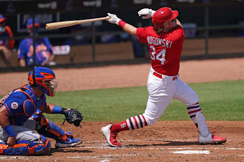 Mar 24, 2021; Jupiter, Florida, USA; St. Louis Cardinals left fielder John Nogowski (34) connects for a solo homerun in the 2nd inning of the spring training game against the New York Mets at Roger Dean Chevrolet Stadium. Mandatory Credit: Jasen Vinlove-USA TODAY Sports