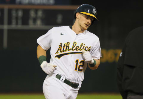 Sep 6, 2022; Oakland, California, USA; Oakland Athletics catcher Sean Murphy (12) rounds the bases on a two-run home run against the Atlanta Braves. Mandatory Credit: Kelley L Cox-USA TODAY Sports