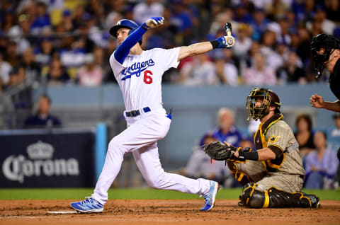 Los Angeles Dodgers shortstop Trea Turner (6) hits a home run during the third inning of game two of the NLDS. Mandatory Credit: Gary A. Vasquez-USA TODAY Sports