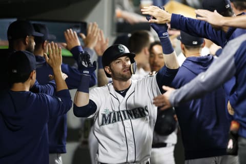 May 14, 2019; Seattle, WA, USA; Seattle Mariners center fielder Mitch Haniger (17) is greeted in the dugout after hitting a two run home run against the Oakland Athletics during the fifth inning at T-Mobile Park. Mandatory Credit: Joe Nicholson-USA TODAY Sports