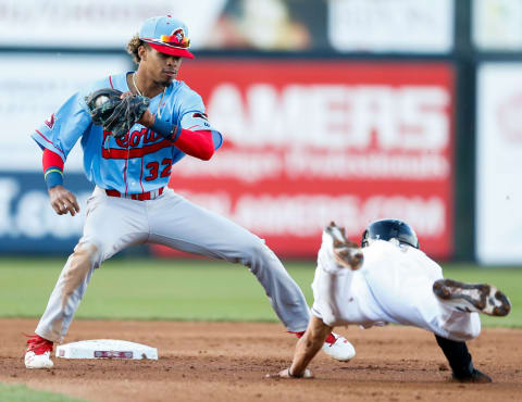 Peoria Chiefs shortstop Delvin Perez (33) holds at second base to tag Wisconsin Timber Rattlers right fielder Jesœs Lujano (7) in the MiLB game between the Peoria Chiefs and Wisconsin Timber Rattlers at Neuroscience Group Field at Fox Cities Stadium on May 22, 2019. The Timber Rattlers won 7-2.Chris Kohley/USA TODAY NETWORK-WisconsinApc Timberrattlers 052219 161