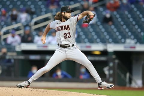 May 7, 2021; New York City, New York, USA; Arizona Diamondbacks starting pitcher Zac Gallen (23) pitches against the New York Mets during the first inning at Citi Field. Mandatory Credit: Brad Penner-USA TODAY Sports