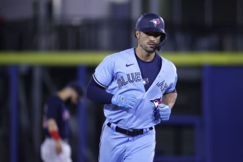 May 18, 2021; Dunedin, Florida, CAN; Toronto Blue Jays center fielder Randal Grichuk (15) hits a two-run home run during the eighth inning against the Boston Red Sox during the eighth inning at TD Ballpark. Mandatory Credit: Kim Klement-USA TODAY Sports