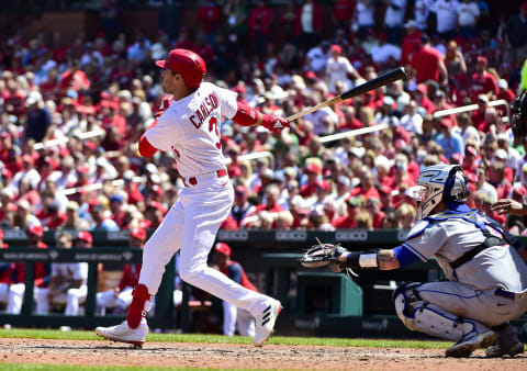 St. Louis Cardinals center fielder Dylan Carlson (3) hits a two run triple against the New York Mets during the fourth inning at Busch Stadium. Mandatory Credit: Jeff Curry-USA TODAY Sports