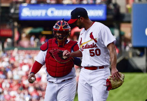 May 15, 2022; St. Louis, Missouri, USA; St. Louis Cardinals catcher Yadier Molina (4) and starting pitcher Adam Wainwright (50) walk in from the bullpen before a game against the San Francisco Giants at Busch Stadium. Mandatory Credit: Jeff Curry-USA TODAY Sports