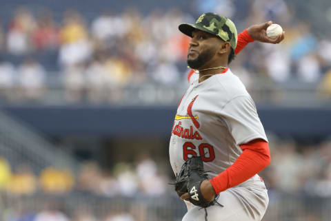 May 22, 2022; Pittsburgh, Pennsylvania, USA; St. Louis Cardinals relief pitcher Angel Rondon (60) pitches against the Pittsburgh Pirates during the first inning at PNC Park. Mandatory Credit: Charles LeClaire-USA TODAY Sports