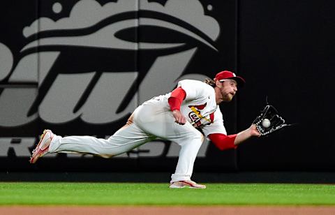 May 23, 2022; St. Louis, Missouri, USA; St. Louis Cardinals right fielder Brendan Donovan (33) dives and catches a ball against the Toronto Blue Jays during the tenth inning at Busch Stadium. Mandatory Credit: Jeff Curry-USA TODAY Sports