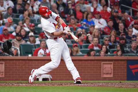 May 27, 2022; St. Louis, Missouri, USA; St. Louis Cardinals first baseman Paul Goldschmidt (46) hits a two-run home run against the Milwaukee Brewers during the third inning at Busch Stadium. Mandatory Credit: Joe Puetz-USA TODAY Sports