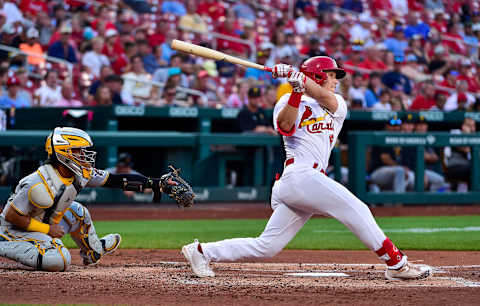 Jun 14, 2022; St. Louis, Missouri, USA; St. Louis Cardinals shortstop Tommy Edman (19) hits a single against the Pittsburgh Pirates during the second inning at Busch Stadium. Mandatory Credit: Jeff Curry-USA TODAY Sports