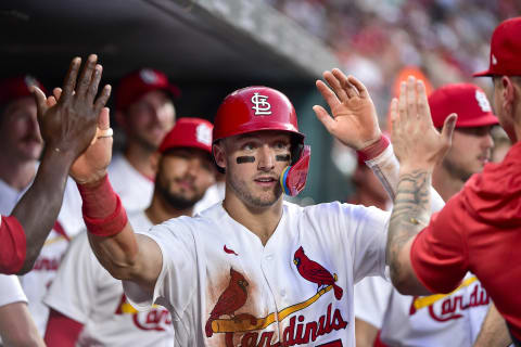 Jun 29, 2022; St. Louis, Missouri, USA; St. Louis Cardinals catcher Andrew Knizner (7) is congratulated by teammates after scoring against the Miami Marlins during the fifth inning at Busch Stadium. Mandatory Credit: Jeff Curry-USA TODAY Sports