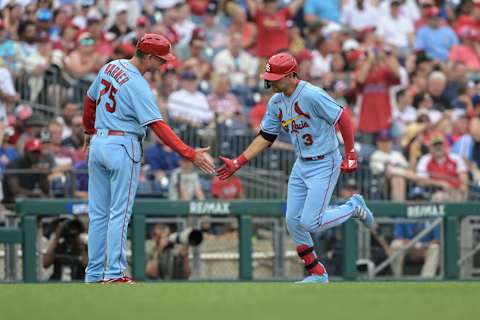 Jul 2, 2022; Philadelphia, Pennsylvania, USA; St. Louis Cardinals center fielder Dylan Carlson (3) celebrates his home run with third base coach Ron ‘Pop’ Warner (75) during the first inning against the Philadelphia Phillies at Citizens Bank Park. Mandatory Credit: John Geliebter-USA TODAY Sports