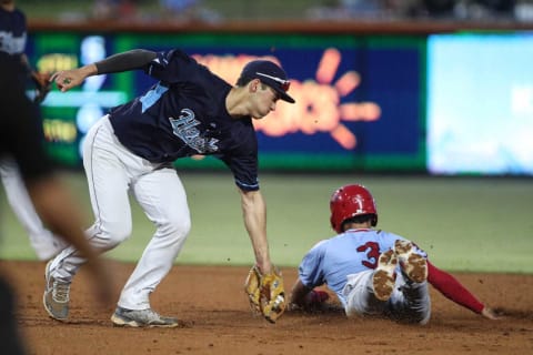 Hooks’ Shay Whitcomb attempts to tag Springfield Cardinal’s Masyn Winn out at second base during the game on Friday, Aug. 5, 2022 at Whataburger Field in Corpus Christi.