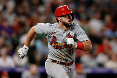 Paul DeJong (11) watches his ball on a double in the fifth inning against the Colorado Rockies at Coors Field. Mandatory Credit: Isaiah J. Downing-USA TODAY Sports