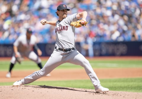 Aug 14, 2022; Toronto, Ontario, CAN; Cleveland Guardians starting pitcher Shane Bieber (57) throws a pitch against the Toronto Blue Jays during the first inning at Rogers Centre. Mandatory Credit: Nick Turchiaro-USA TODAY Sports