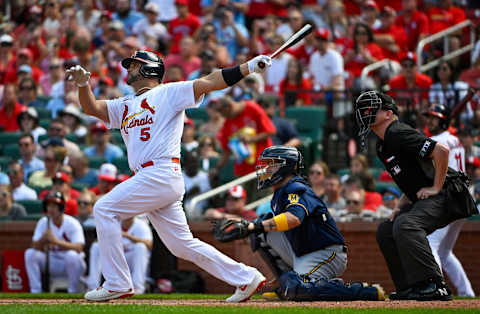 Aug 14, 2022; St. Louis, Missouri, USA; St. Louis Cardinals designated hitter Albert Pujols (5) hits a three run home run against the Milwaukee Brewers during the eighth inning at Busch Stadium. Mandatory Credit: Jeff Curry-USA TODAY Sports