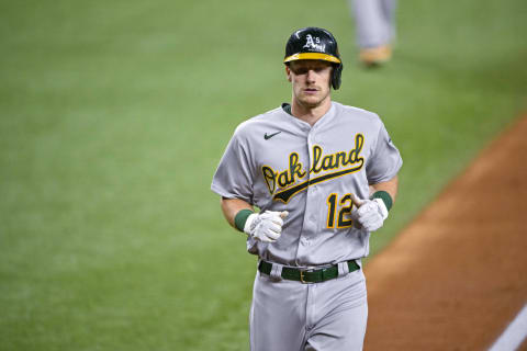 Aug 17, 2022; Arlington, Texas, USA; Oakland Athletics catcher Sean Murphy (12) rounds the bases after hitting a home run against the Texas Rangers during the first inning at Globe Life Field. Mandatory Credit: Jerome Miron-USA TODAY Sports