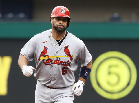 Sep 11, 2022; Pittsburgh, Pennsylvania, USA; St. Louis Cardinals first baseman Albert Pujols (5) circles the bases after hitting a two-run home run against the Pittsburgh Pirates during the ninth inning at PNC Park. The home run is the 697th home run of Pujols’ career giving him sole possession of fourth place all time on the MLB career home run list. The Cardinals won 4-3. Mandatory Credit: Charles LeClaire-USA TODAY Sports