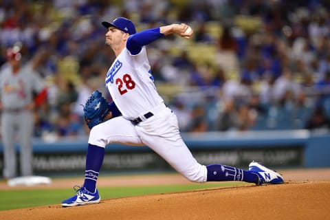 Sep 23, 2022; Los Angeles, California, USA; Los Angeles Dodgers starting pitcher Andrew Heaney (28) throws against the St. Louis Cardinals during the first inning at Dodger Stadium. Mandatory Credit: Gary A. Vasquez-USA TODAY Sports