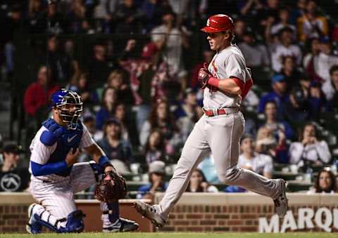 Jun 5, 2022; Chicago, Illinois, USA; St. Louis Cardinals third baseman Nolan Gorman (16) scores a run past Chicago Cubs catcher Willson Contreras (40) in the 11th inning at Wrigley Field. Mandatory Credit: Benny Sieu-USA TODAY Sports