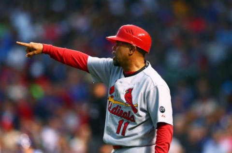 Jul 8, 2015; Chicago, IL, USA; St. Louis Cardinals third base coach Jose Oquendo reacts against the Chicago Cubs at Wrigley Field. Mandatory Credit: Mark J. Rebilas-USA TODAY Sports