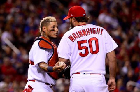 Apr 4, 2017; St. Louis, MO, USA; St. Louis Cardinals catcher Yadier Molina (4) talks with starting pitcher Adam Wainwright (50) during the fourth inning against the Chicago Cubs at Busch Stadium. Mandatory Credit: Jeff Curry-USA TODAY Sports