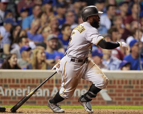 Aug 29, 2016; Chicago, IL, USA; Pittsburgh Pirates second baseman Josh Harrison (5) hits a two run RBI double during the seventh inning against the Chicago Cubs at Wrigley Field. Mandatory Credit: Caylor Arnold-USA TODAY Sports