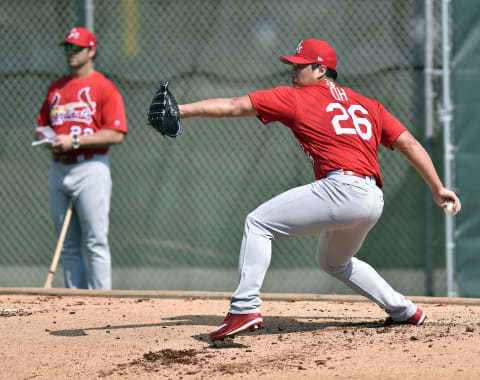 Feb 14, 2017; Jupiter, FL, USA; St. Louis Cardinals relief pitcher Seung Hwan Oh (26) throws during Spring Training workouts at Roger Dean Stadium. Mandatory Credit: Steve Mitchell-USA TODAY Sports