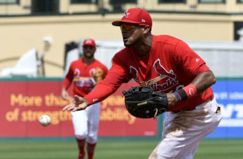 Mar 13, 2017; Jupiter, FL, USA; St. Louis Cardinals first baseman Jose Martinez (58) tosses to first base for an out against the Houston Astros during a spring training game at Roger Dean Stadium. The Cardinals defeated the Astros 6-3. Mandatory Credit: Scott Rovak-USA TODAY Sports