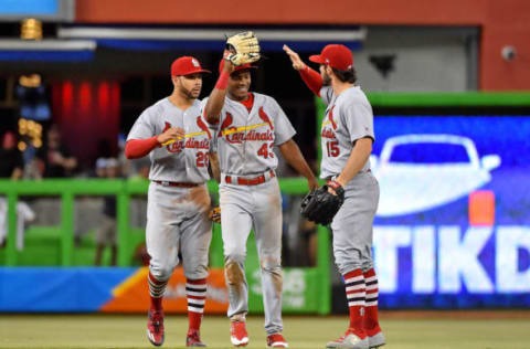 May 9, 2017; Miami, FL, USA; St. Louis Cardinals left fielder Tommy Pham (28) and center fielder Magneuris Sierra (43) and right fielder Randal Grichuk (15) celebrate after defeating the Miami Marlins at Marlins Park. Mandatory Credit: Jasen Vinlove-USA TODAY Sports