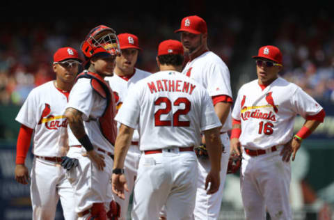 May 25, 2016; St. Louis, MO, USA; St. Louis Cardinals manager Mike Matheny pays a visit to the mound to speak with relief pitcher Jonathan Broxton (30) during the seventh inning against the Chicago Cubs at Busch Stadium. The Cubs won the game 9-8. Mandatory Credit: Billy Hurst-USA TODAY Sports