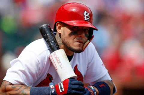 Apr 6, 2017; St. Louis, MO, USA; St. Louis Cardinals catcher Yadier Molina (4) waits in the batters circle during the first inning of a game against the Chicago Cubs at Busch Stadium. Mandatory Credit: Scott Kane-USA TODAY Sports