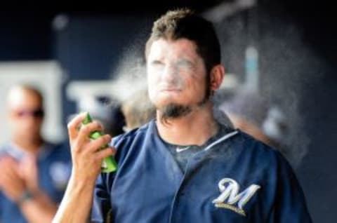 Apr 2, 2015; Peoria, AZ, USA; (Editors note: Caption correction) Milwaukee Brewers starting pitcher Matt Garza (22) applies sun screen prior to the game against the San Diego Padres at Peoria Sports Complex. Mandatory Credit: Matt Kartozian-USA TODAY Sports