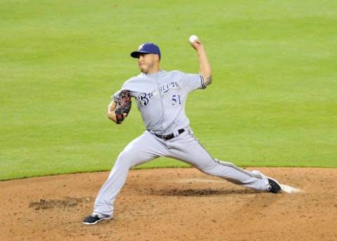 Sep 8, 2015; Miami, FL, USA; Milwaukee Brewers relief pitcher Cesar Jimenez (51) throws against the Miami Marlins during the fourth inning at Marlins Park. Mandatory Credit: Steve Mitchell-USA TODAY Sports