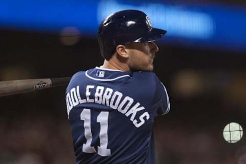 Jun 23, 2015; San Francisco, CA, USA; San Diego Padres third baseman Will Middlebrooks (11) hits a double against the San Francisco Giants during the eighth inning at AT&T Park. Mandatory Credit: Ed Szczepanski-USA TODAY Sports