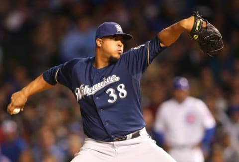 Sep 21, 2015; Chicago, IL, USA; Milwaukee Brewers starting pitcher Wily Peralta (38) delivers a pitch during the first inning against the Chicago Cubs at Wrigley Field. Mandatory Credit: Caylor Arnold-USA TODAY Sports