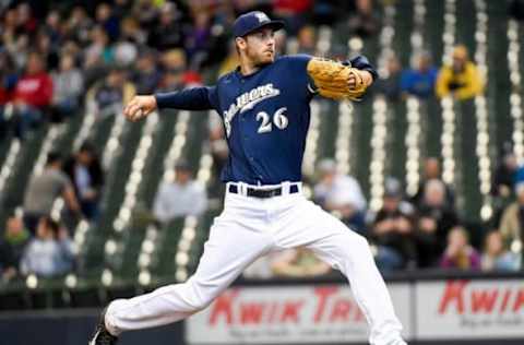 Apr 6, 2016; Milwaukee, WI, USA; Milwaukee Brewers pitcher Taylor Jungmann (26) pitches in the first inning against the San Francisco Giants at Miller Park. Mandatory Credit: Benny Sieu-USA TODAY Sports